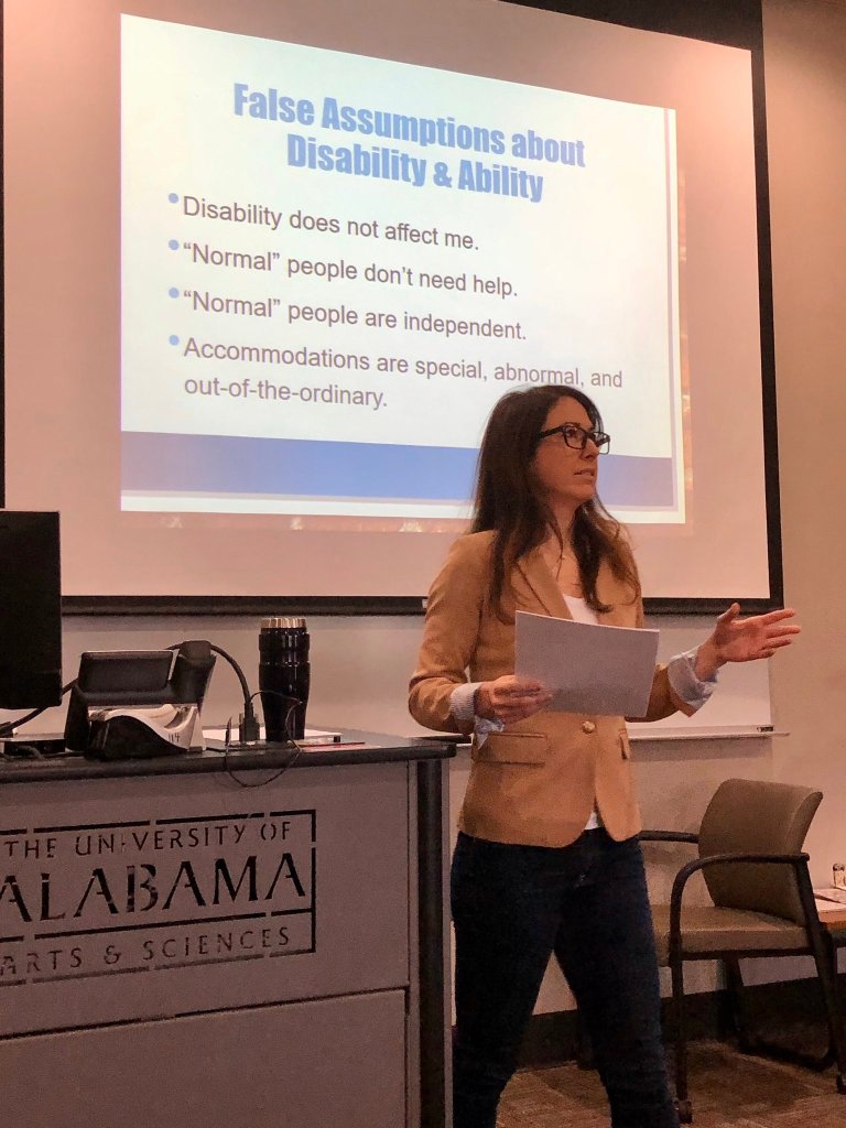 Anne-Marie Womack presenting on false assumptions about disability